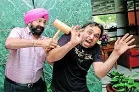Bhagwan Mann (right) with Jaspal Bhatti (right). Bhagwan Mann (right) with Jaspal Bhatti (right).