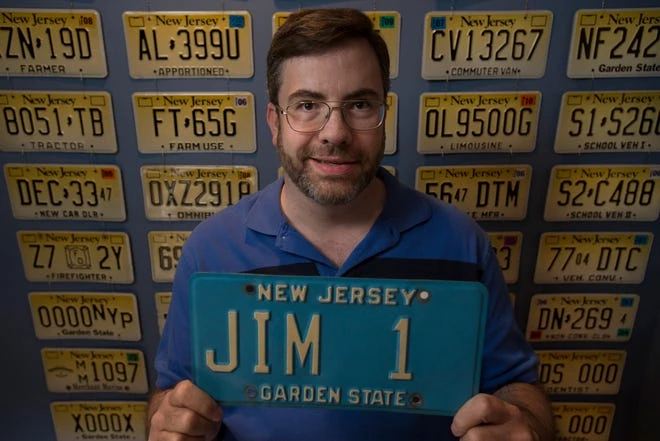 127432 BERGENFIELD, NJ 05/30/2014 License plate collector Jim Moini with part of his NJ license plate collection at his home in Bergenfield. MICHAEL KARAS / PERSONAL PHOTOGRAPHER