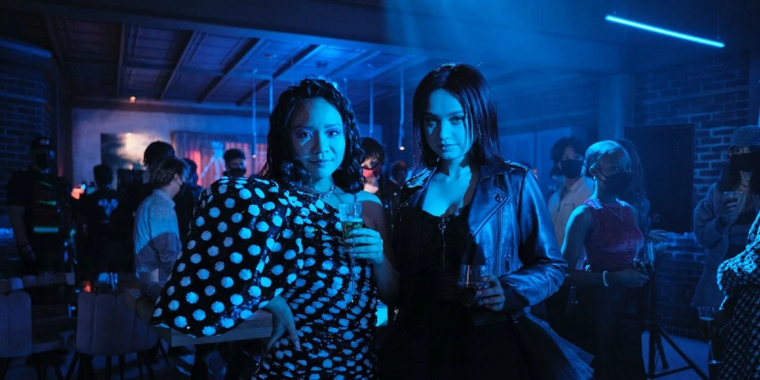 Characters, Zoe and Rebecca, in a dark nightclub in 